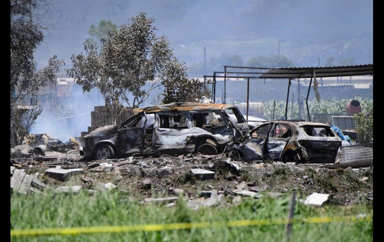 Algunos vehículos se quemaron. AFP/P. Pardo