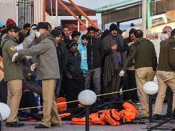 Los viajeros, entre ellos 93 hombres, 11 menores y dos mujeres embarazadas, fueron acogidos por personal de la Cruz Roja. AFP/ARCHIVO