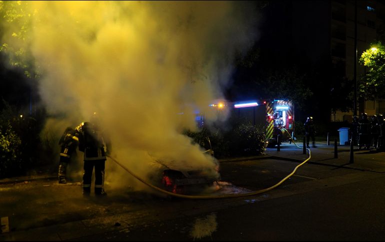 En los disturbios han sido incendiados más de 200 vehículos. AFP/G. Souvant
