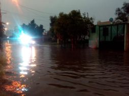 Tras lluvia rescatan a mujer embarazada de vivienda en Tlajomulco