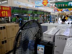 Una medida de represalia que Beijing podría usar es adoptar un nuevo plan para atraer más inversión extranjera, pero no de EU. AP/A. Won