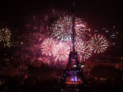 Fotogalería: La Torre Eiffel se ilumina en la fiesta nacional francesa