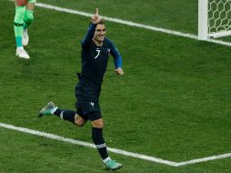 Griezmann celebra tras convertir desde los once pasos. AFP/A. Dennis