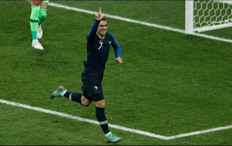 Griezmann celebra tras convertir desde los once pasos. AFP/A. Dennis