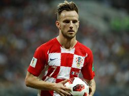 A pesar de la tristeza por la derrota, Rakitic felicita a los Bleus. AFP/O. Andersen