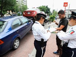 Varios vehículos que operan para Uber, y otras Empresas de Redes de Transporte, fueron retirados ayer por no cumplir con el registro ante la Secretaría de Movilidad. EL INFORMADOR/G. Gallo