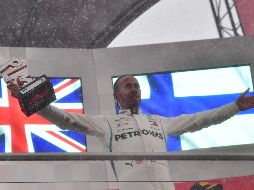 Hamilton celebra su triunfo. AFP / A. Isakovic