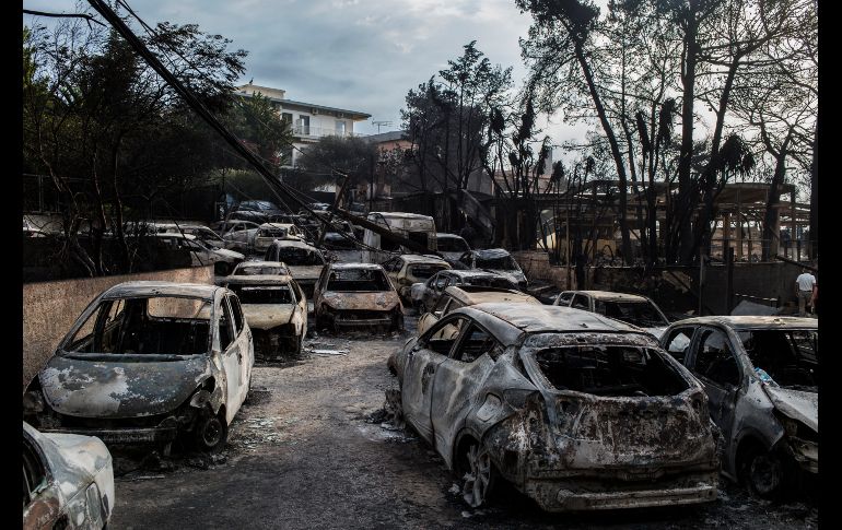 Varios vecinos señalan haber escuchado numerosas explosiones debido a bombonas de gas, muy comunes en las residencias de verano. AFP/A. Tzortzinis