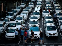 Aspecto de una calle de Madrid tomada por miles de taxistas. AFP/G. Bouys