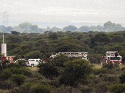 Agentes del Ministerio Público y personal de la Coordinación de Servicios Periciales de la Agencia de Investigación Criminal acudieron al lugar de los hechos. AFP / K. Alcantar