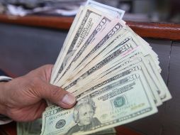 El Banco BASE prevé que el tipo de cambio oscile entre 18.55 y 18.75 pesos por dólar en cotizaciones interbancarias a la venta. EL INFORMADOR / ARCHIVO