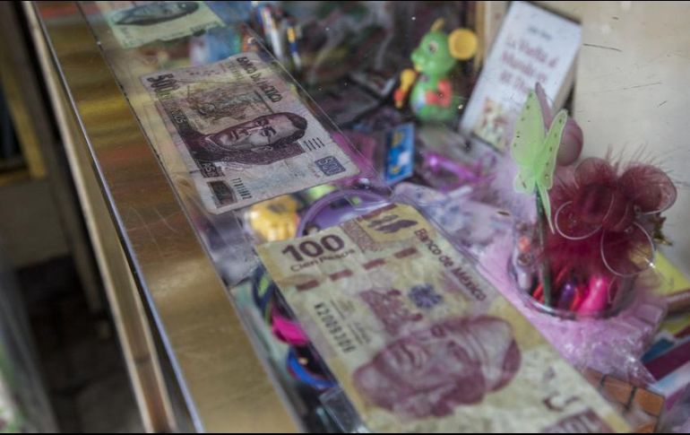 En un domicilio de Nuevo León se encontraron decenas de billetes de 100 y 200 pesos falsos, presuntamente fabricados ahí mismo. EL INFORMADOR / ARCHIVO