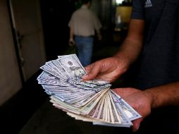 El tipo de cambio presentó un máximo en 18.5208 unidades, mientras que el mínimo se reportó en 18.4050 unidades en el mercado de mayoreo. AP/E. Noroozi