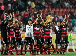 Los Xolos festejan su victoria al final del partido. MEXSPORT