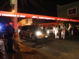 Los peritos localizaron tres casquillos percutidos sobre el puente peatonal, lo que indica que habrían ejecutado a los dos hombres en ese lugar para después colgarlos. EL INFORMADOR / ARCHIVO