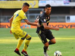 El portugués (D) estuvo cerca del gol en un par de ocasiones durante el partido. AFP/A. Pizzoli