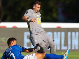 Héctor Herrera fue titular y capitán de los Dragones. EFE/A. Cotrim