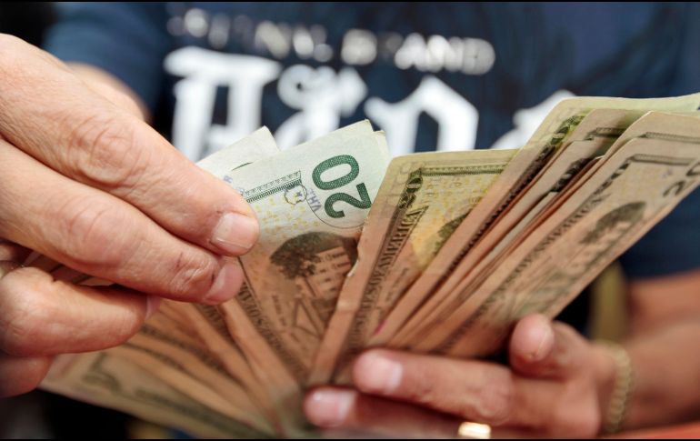 El Banxico fijó el tipo de cambio para solventar obligaciones denominadas en moneda extranjera pagaderas en el país en 18.7900 pesos. EL INFORMADOR /ARCHIVO