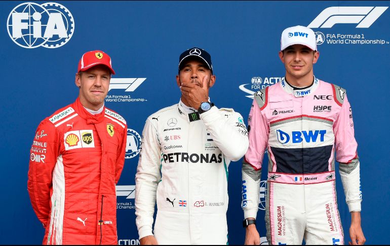 El líder del Mundial de F1 estará el domingo acompañado en primera línea por su perseguidor en la clasificación general, el alemán Sebastian Vettel, y tras ellos el francés Esteban Ocon. AFP / J. Thys
