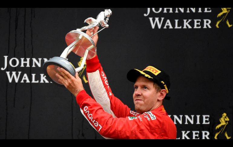 Vettel (foto) logró el triunfo 52 de su carrera, tras adelantar a Hamilton, que salió desde la pole, en la primera vuelta. AFP / J. Thys