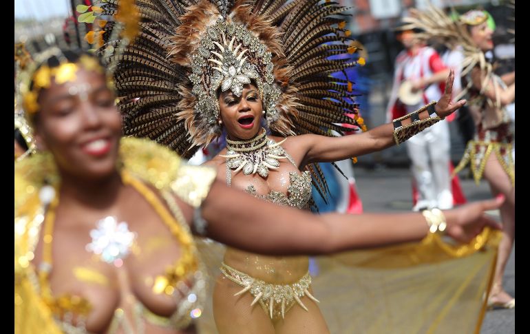 El carnaval tiene su antecedente en el festival de 1959 en el área londinense de St. Pancras, con el objetivo de incentivar las relaciones entre británicos y caribeños..