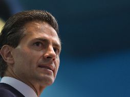 En un video publicado en redes sociales, Peña Nieto destacó que México se ha consolidado como un país que comercia con todo el mundo. AFP / ARCHIVO