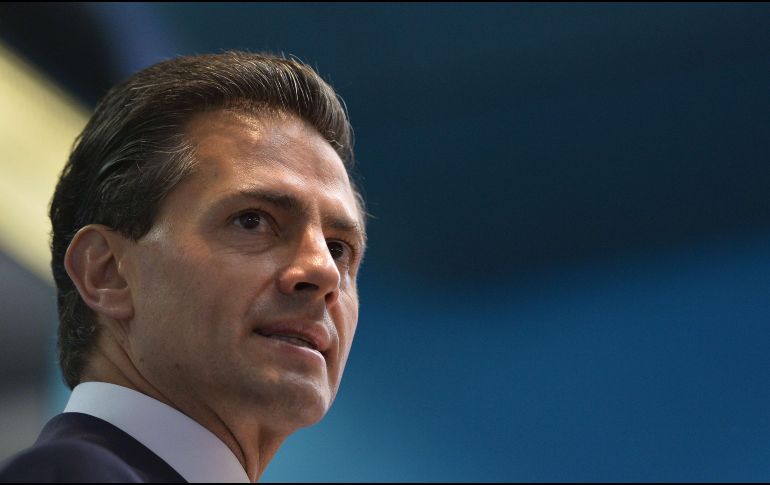 En un video publicado en redes sociales, Peña Nieto destacó que México se ha consolidado como un país que comercia con todo el mundo. AFP / ARCHIVO