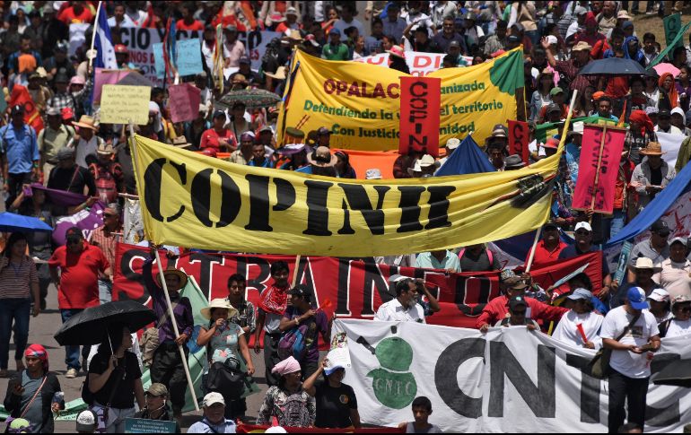 Los manifestantes también exigen justicia para las “34 personas asesinadas” durante la crisis derivada del presunto fraude electoral. AFP/O. Sierra