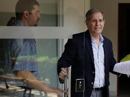 El coordinador de la misión en Nicaragua para América Central de ACNUDH, Guillermo Fernández Maldonado, sale de una conferencia de prensa tras comunicar la decisión de Ortega. EFE/J. Torres