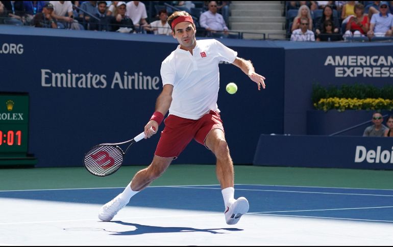 Kyrgios intentó peloteos cercanos a la red buscando cansar a Federer, sin resultados. AFP/T. A. Clary