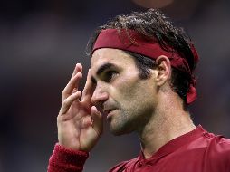Federer, cinco veces ganador en las pistas duras de NY, firmó uno de sus peores encuentros de los últimos tiempos y sucumbió por 6-3, 5-7, 6-7 (7/9), 6-7 (3/7) en tres horas y 33 minutos de juego. AFP / J. Finney