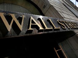 El NYSE Composite retrocede 8.05 puntos, ubicándose en 12 mil 960.50 unidades. AP / R. Drew
