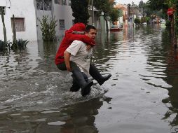 Protección Civil del Estado informó que no se tiene reportes de personas lesionadas, sólo de algunos conductores vehículos que quedaron varados en calles inundadas. NTX / ARCHIVO