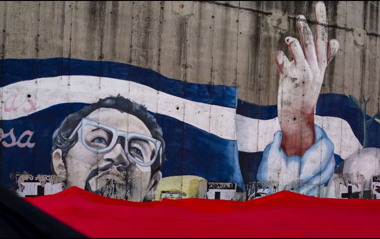 Los asistentes expresaron su respaldo a Ortega en medio de música revolucionaria y cargando, en su mayoría, banderas del Frente Sandinista de Liberación Nacional. EFE/J. Torres