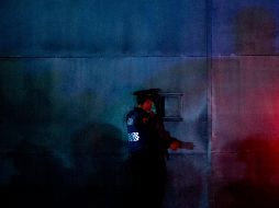 En el interior de la Ford Lobo, que contaba con reporte de robo, se localizaron varias armas de fuego y cargadores. AP/ARCHIVO