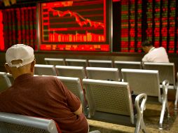La plaza bursátil local terminó en línea con los índices accionarios de Estados Unidos. AP/M. Schiefelbein