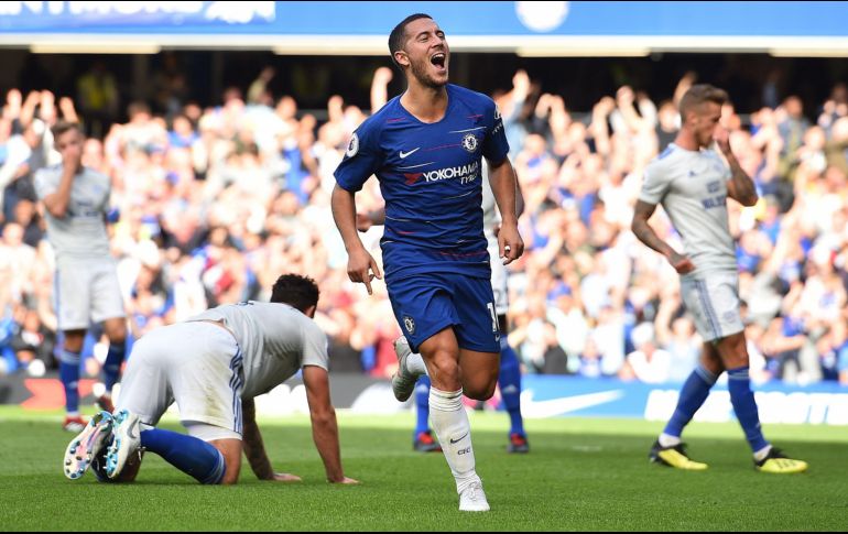 La máxima figura del Chelsea, Eden Hazard, se cargó el equipo al hombro y anotó tres goles para lograr la remontada y dar la victoria a los suyos. AFP / G. Kirk
