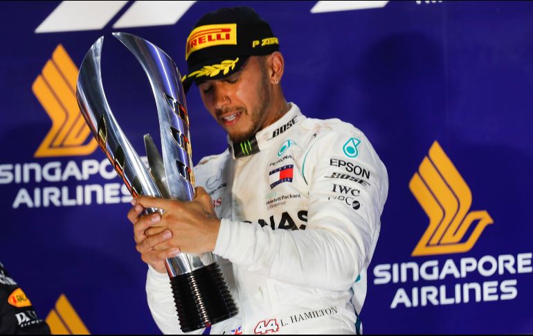 Hamilton, cuatro veces monarca de la F1, conquistó su séptima carrera de la temporada. AP / V. Thian