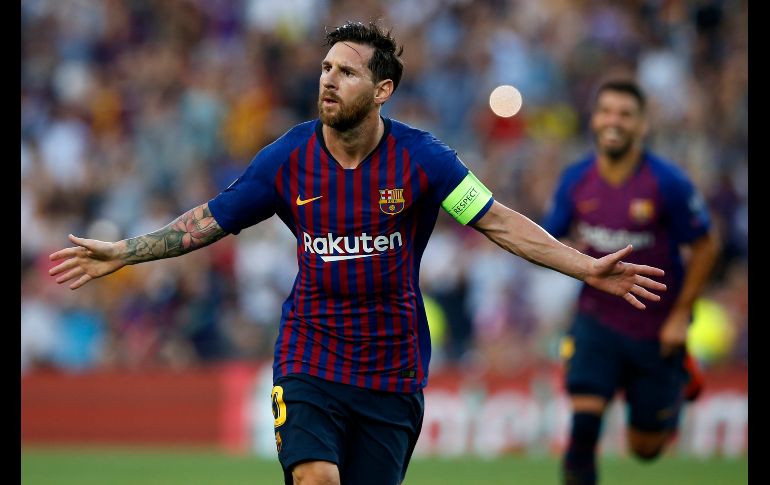 El delantero del FC Barcelona, Lionel Messi, celebra su gol anotado durante el primer partido del grupo B de la Liga de Campeones, disputado contra el PSV Eindhoven en Barcelona. AP/M. Fernandez