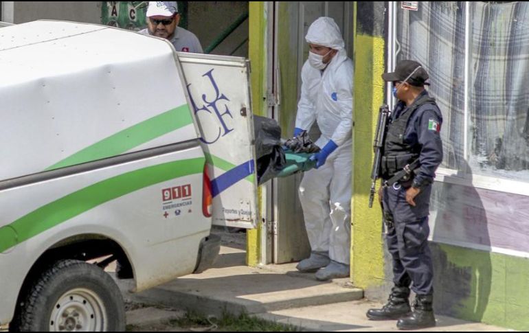 Desde junio de este año se han localizado medio centenar de cadáveres en fincas de fosas clandestinas en el Estado. Más de la mitad de estos cuerpos se exhumaron en Tlajomulco. AFP / ARCHIVO