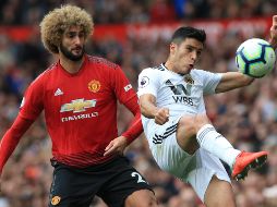 Jiménez (d) jugó los 90 minutos del partido y tuvo una destacada participación. AFP / L. Parnaby