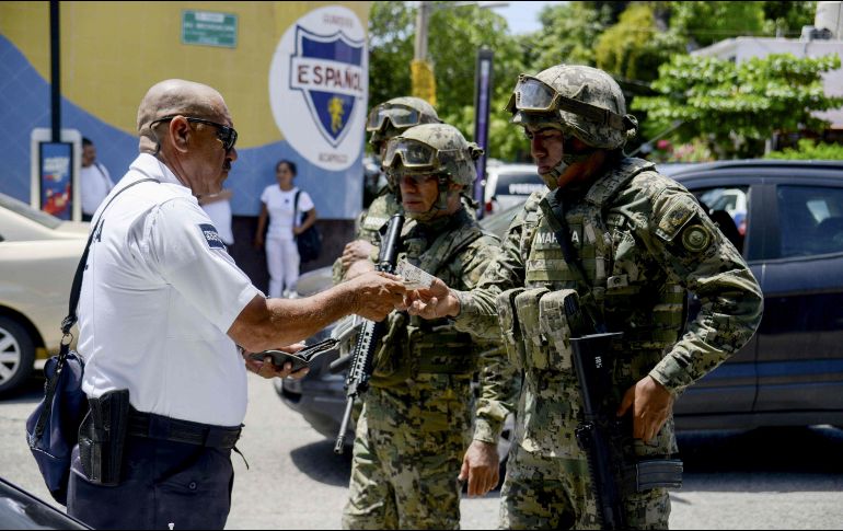 Este martes, las fuerzas federales asumieron el control de la seguridad en el puerto. AFP/F. Robles