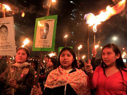 Familiares y colectivos marcharon con la petición de justicia y de encontrar a los normalistas con vida. EFE/M. Guzmán