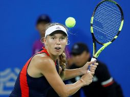 La danesa Wozniacki, número dos del mundo, se despidió ante la puertorriqueña Mónica Puig (7-6 (12/10), 7-5). EFE / W. Hong