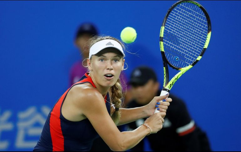 La danesa Wozniacki, número dos del mundo, se despidió ante la puertorriqueña Mónica Puig (7-6 (12/10), 7-5). EFE / W. Hong