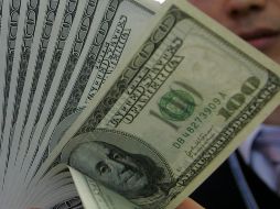 El dólar se adquirió en un precio mínimo de 17.75 pesos en sucursales bancarias de la capital del país. EL INFORMADOR / ARCHIVO