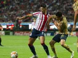 Pulido (I) anotó el 1-1 momentáneo al 10', pero Chivas desapareció a la ofensiva en el segundo tiempo. SUN/RCC