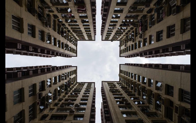 Un grupo de edificios residenciales se ve en Hong Kong, China. AFP/A. Wallace