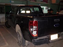 La Policía Estatal encontró 18 casquillo percutidos, así como impactos en la fachada del ayuntamiento, carros particulares y oficiales. EFE