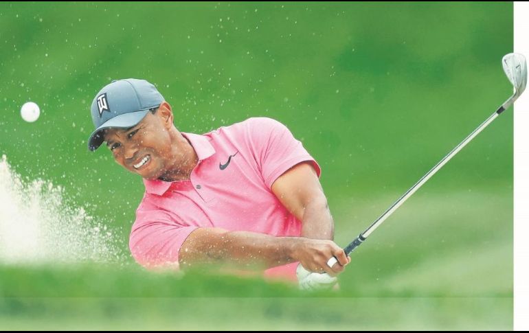 Tras cuatro operaciones en la espalda, el estadounidense Tiger Woods regresó como en sus mejores tiempos y ganó el Tour Championship. AP / ARCHIVO